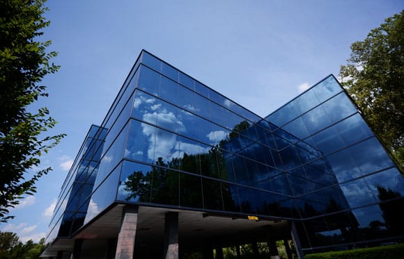 outside picture of building with mirrored windows on sunny day