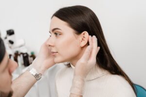 Woman meeting with doctor to discuss ear surgery