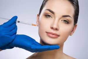 Woman has fuller cheeks thanks to augmentation with filler