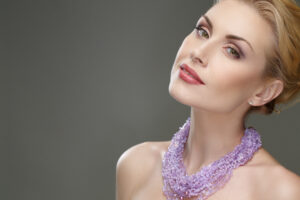 Woman has smooth neck and jaw contours thanks to cosmetic procedures minimizing her chin fat