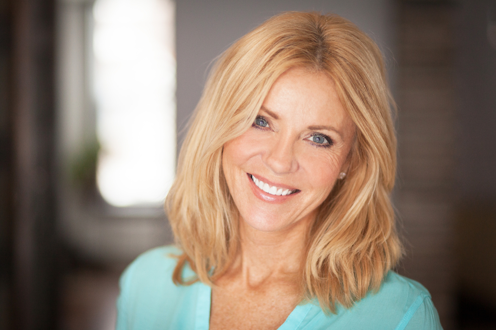 Blonde woman in her early 60s has rejuvenated eyes with blepharoplasty in Bergen County.
